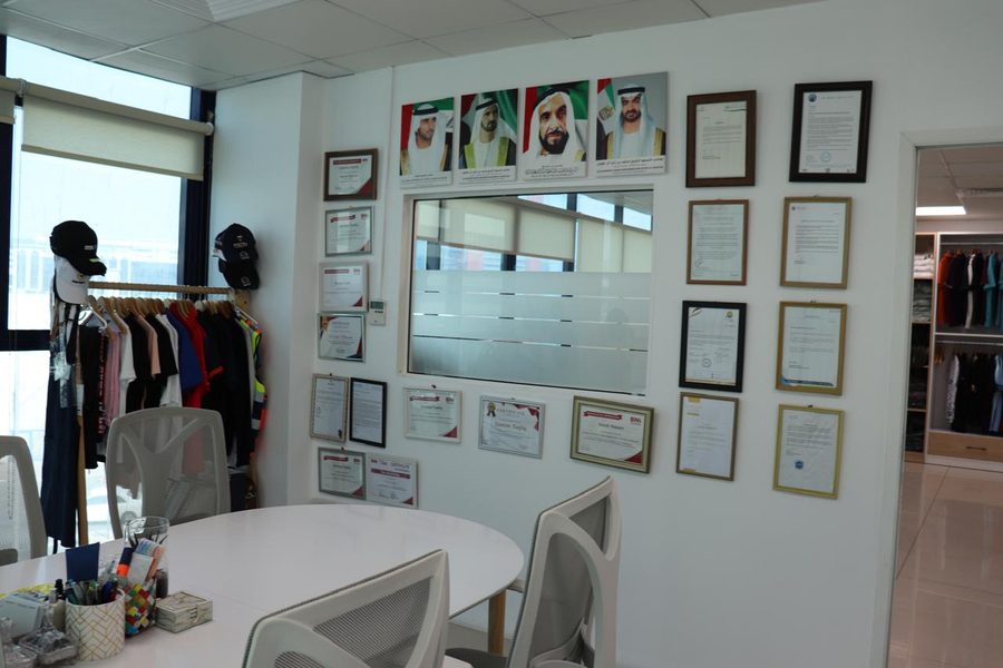Certificate wall — caps and headwear rack
