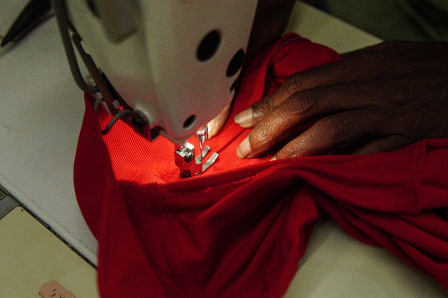 Hemming a red garment